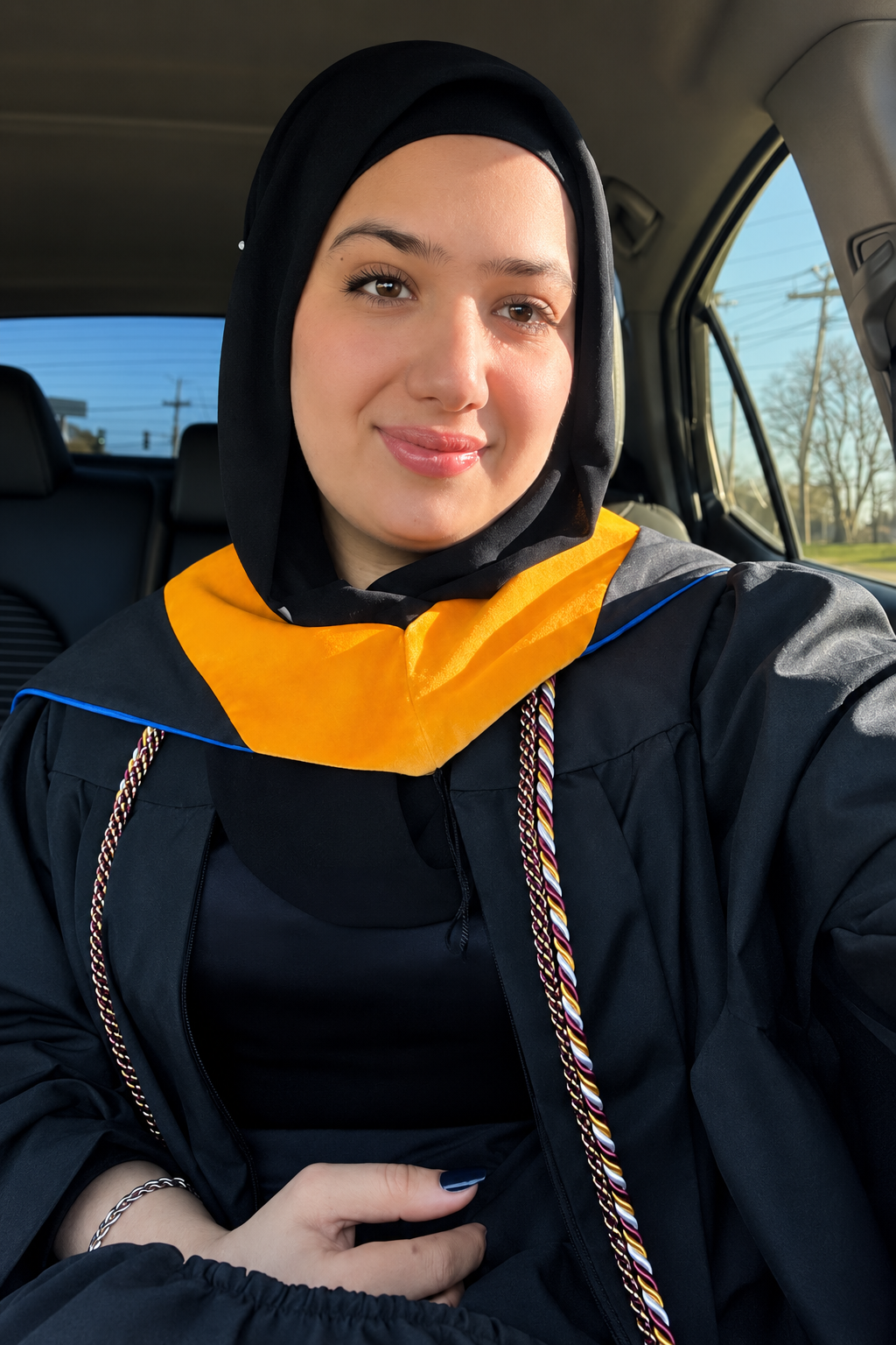 Shayesta Baqaakhail wearing her graduation regalia